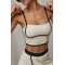 Спортивный костюм женский с топом и юбкой-шортами Lurex