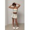 Спортивный костюм женский с топом и юбкой-шортами Lurex
