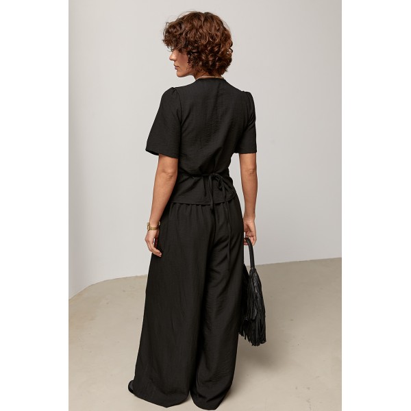 Костюм жіночий літній із запахом з трикотажу чорний Lurex