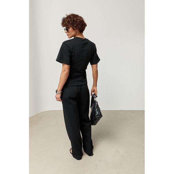 Костюм женский трикотажный с декоративными швами черный Lurex
