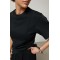 Костюм женский трикотажный с декоративными швами черный Lurex