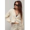 Кардиган жіночий короткий з косами молочний Lurex
