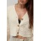 Кардиган жіночий короткий з косами молочний Lurex