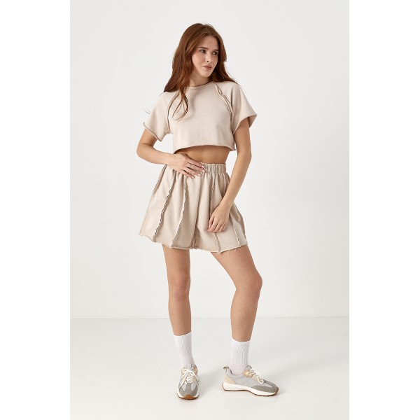 Костюм женский трикотажный со швами наружу бежевый Lurex