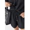 Костюм женский полиэстеровый свободный с шортами черный Lurex