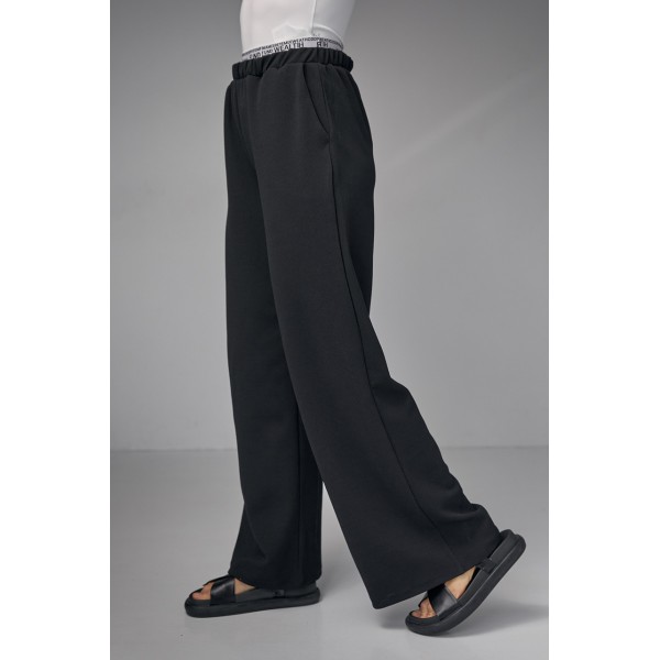 Брюки свободные женские трикотажные широкие черные Lurex