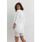 Костюм женский трикотажный футболка oversize и велосипедки молочный Lurex